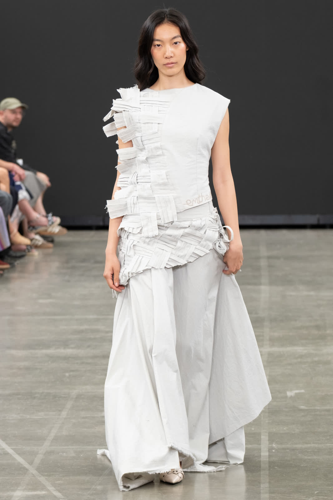 Look 05, pleated strip manipulation across the bodice over full trousers. Photograph by Stone Clove.