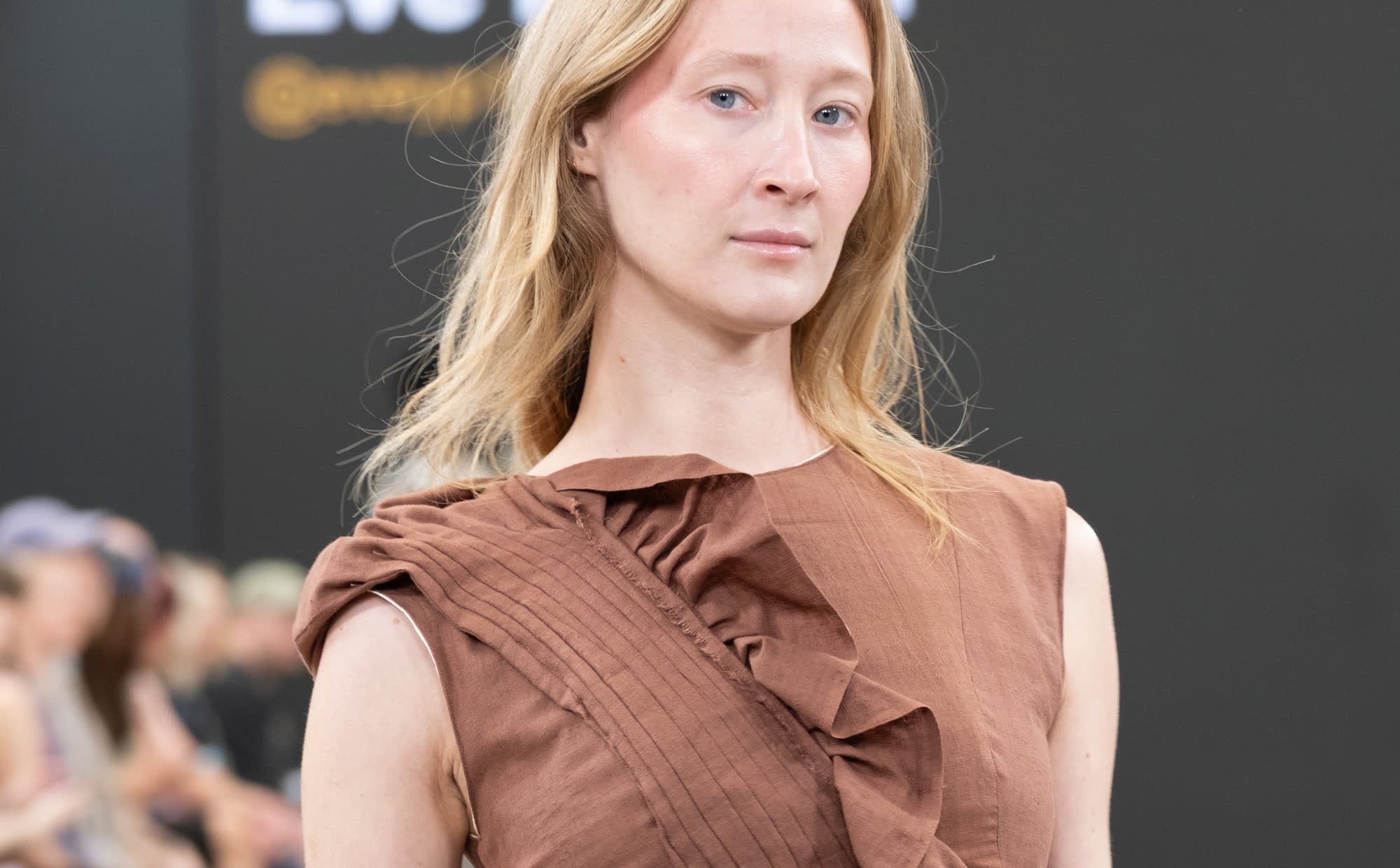Look 06 in rust linen. Photograph by Stone Clove